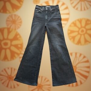 Washed black ribcage bell bottom jeans by Levi’s, Size 25